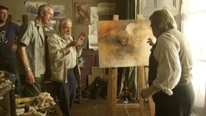 Actor Timothy Spall (r.), director Mike Leigh (ctr.) and cinematographer Dick Pope on the set of Mr. Turner.